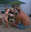 Shaving on the beach at Mahale - click to view detail